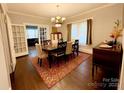Elegant dining room with a large table and classic chandelier at 127 E 11Th St, Salisbury, NC 28144