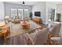 Bright and inviting living room featuring stylish furnishings and plenty of natural light at 2018 Hyacinth Ct, Denver, NC 28037