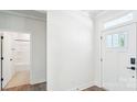 Bright foyer with a view into the bathroom and featuring tile and wood-look flooring at 228 Miramar Dr, York, SC 29745