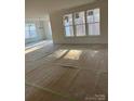 Spacious living room featuring ample natural light and open layout at 2358 Fay Jones Rd, Denver, NC 28037
