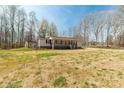 Spacious property featuring a single-story home, detached shed, and large front yard at 4604 Karwood Dr, Rock Hill, SC 29732