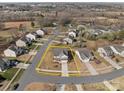 Aerial view showcasing the property's location within a neighborhood, highlighted by a yellow border at 603 Smokehouse Ln, Albemarle, NC 28001