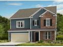 Charming two-story home featuring blue siding, brick accents, and a covered front porch at 166 Holsworthy Dr, Mooresville, NC 28115