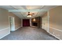 Cozy living room showcases a brick fireplace, neutral walls, and ample space for relaxation at 350 Brawley Rd, Cleveland, NC 27013