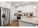 Bright kitchen featuring stainless appliances, and plenty of white cabinetry at 4427 Allenby Pl, Monroe, NC 28110