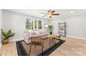 Bright living room featuring neutral walls, modern furnishings, and natural light from a large window at 627 Westway Dr, Gastonia, NC 28054