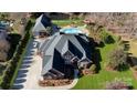 Expansive property with a large home, pool, and well-maintained grounds at 1038 Rolling Park Ln, Fort Mill, SC 29715