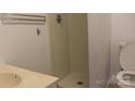 Bathroom featuring a shower, sink, and toilet offering essential amenities at 1629 & 1631 Harris Rd # 6&7, Fort Mill, SC 29708