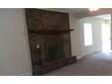 Living room with a brick fireplace and mantel, enhancing the home's charm at 1629 & 1631 Harris Rd # 6&7, Fort Mill, SC 29708