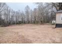 Expansive backyard with lots of space for any desired outdoor activities at 176 Gravel Hill Ct, Taylorsville, NC 28681