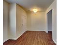 Spacious open-plan living room with hardwood floors at 8906 Paddle Oak Rd, Charlotte, NC 28227