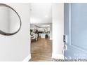 Inviting entryway featuring wood-look floors and open view into dining and kitchen at 11032 Gary Player Dr # 961, Lancaster, SC 29720
