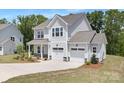 Beautifully designed two-story home with a two-car garage and attractive curb appeal at 11032 Gary Player Dr # 961, Lancaster, SC 29720
