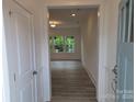 Light-filled home entrance featuring hardwood floors and modern fixtures at 29069 Low Country Ln # 602, Lancaster, SC 29720