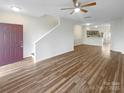 Bright and airy living room with new flooring and open floor plan at 8813 Gerren Ct, Charlotte, NC 28217