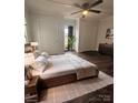 Bright bedroom with modern bed frame and ceiling fan at 1224 Hollywood Ter, Albemarle, NC 28001