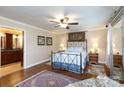 Bedroom featuring a beautiful four-poster bed, hardwood floors, ceiling fan and ensuite bathroom at 2622 Oakhurst Dr # 23, Rock Hill, SC 29730