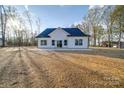 The backyard has a nice patio and plenty of space for entertaining and outdoor activities at 0000 Trull Hinson Rd # 1, Wingate, NC 28174