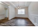 Elegant dining room with coffered ceilings, wainscoting, and large windows for abundant natural light at 2252 Tabor Rd # 575, Sherrills Ford, NC 28673