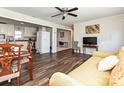 Open-concept living area flows into the kitchen, highlighted by hardwood floors and ample natural light at 464 Willetta Nw Pl, Concord, NC 28027