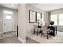 Bright and airy home office with modern decor, neutral colors, and ample natural light at 1208 Cottage Green Dr # 0140, Monroe, NC 28112