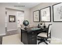 Stylish home office with a modern desk and decor, creating an ideal work-from-home space at 1208 Cottage Green Dr # 0140, Monroe, NC 28112