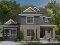 Charming two-story home featuring red brick, navy siding, and a welcoming covered porch at 19104 Newburg Hill Rd, Davidson, NC 28036