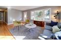 Cozy living room with large windows, hardwood floors, and modern decor at 2036 Edgewater Dr, Charlotte, NC 28210