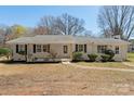 Charming one-story home with a manicured lawn and fresh exterior paint at 2509 Wesley Chapel Rd, Indian Trail, NC 28079