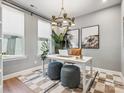 Bright office space with neutral walls, large windows, stylish lighting, and modern decor for a productive work environment at 408 Old Town Village Rd, Waxhaw, NC 28173
