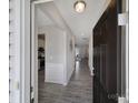 Inviting entryway with wood-look flooring, neutral paint, and an open view into the living spaces, setting a welcoming tone at 4631 Christina Ct, Gastonia, NC 28056
