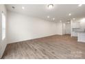 Spacious living room features recessed lighting and neutral wall paint at 2749 Yeager Nw Dr, Concord, NC 28027
