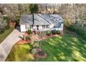 Inviting single-story home with mature trees and landscaped yard at 1025 Hunter Valley Rd, Shelby, NC 28150