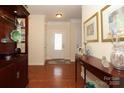 Welcoming foyer with hardwood floors, elegant decor, and a view of the front door at 3102 Arches Bluff Cir, Lancaster, SC 29720