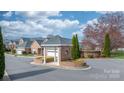 Welcoming community entrance with brick signage, manicured landscaping, and attractive architectural details at 3131 9Th Street Ne Dr # 31, Hickory, NC 28601