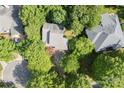 An aerial view of a home surrounded by lush greenery and trees at 9423 Fairmead Dr, Charlotte, NC 28269