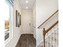 Hallway with wood floors, stairs, and natural light at 1305 31St Ne St, Conover, NC 28613