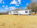 Well-maintained single-story home with a inviting porch and manicured lawn at 4055 10Th Avenue Sw Dr, Hickory, NC 28602