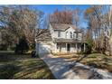 Beautiful two-story home with a well-manicured lawn and attached one car garage at 617 Edinburgh Ct, Rock Hill, SC 29730