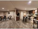Open concept living room showcasing hardwood floors and modern kitchen appliances at 119 Jack Adams Rd, Kings Mountain, NC 28086
