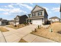 Two-story home with a manicured lawn, two-car garage, and inviting curb appeal at 123 Clauser N Rd, Mount Holly, NC 28120