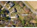 Birds eye view of the property and its expansive, well-maintained backyard and landscaping at 123 Southhaven Dr, Mooresville, NC 28117