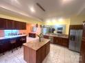 Spacious kitchen featuring an island, stainless steel appliances, and abundant cabinet space at 1514 Ring Tail Rd, Claremont, NC 28610