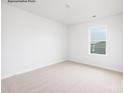 Bedroom with neutral carpet and window at 2319 Riggs Rd, Sherrills Ford, NC 28673