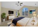 Bedroom with a large window, ceiling fan, and ample natural light at 2905 Polo View Ln, Matthews, NC 28105