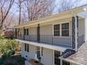 Upper-level balcony showing decorative railings and gray painted brick at 306 7Th Street Ne Pl, Conover, NC 28613