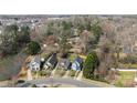 Aerial view of homes in a wooded suburban neighborhood at 4627 Eaves Ln, Charlotte, NC 28215