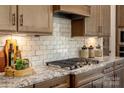 Well-equipped kitchen features a gas cooktop and granite countertops at 6026 Gray Shadow Ct, York, SC 29745