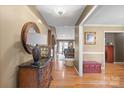 Elegant entryway with hardwood floors and stylish furnishings, creating a warm and welcoming atmosphere at 1529 Indian Springs Nw Dr, Conover, NC 28613
