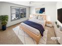 Cozy main bedroom with a comfortable bed, natural light, and stylish decor at 5006 Brodie Ln, Fort Mill, SC 29707